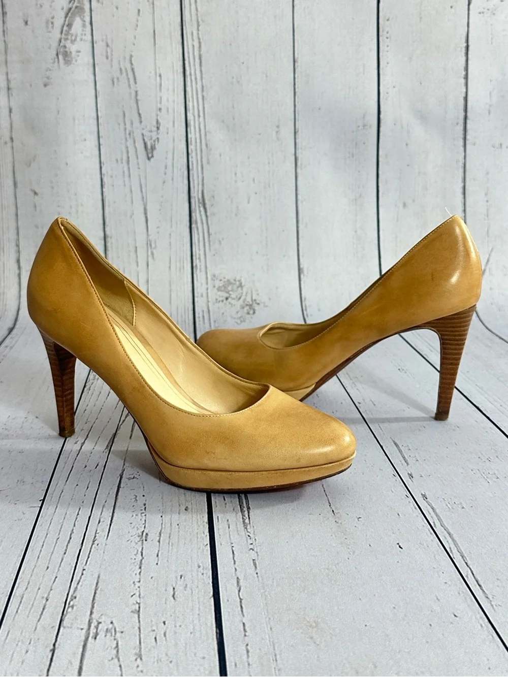 Cole Haan Chelsea pumps featuring a stacked heel and tan leather women’s size 9B